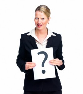 Confused business woman holding a paper with question mark